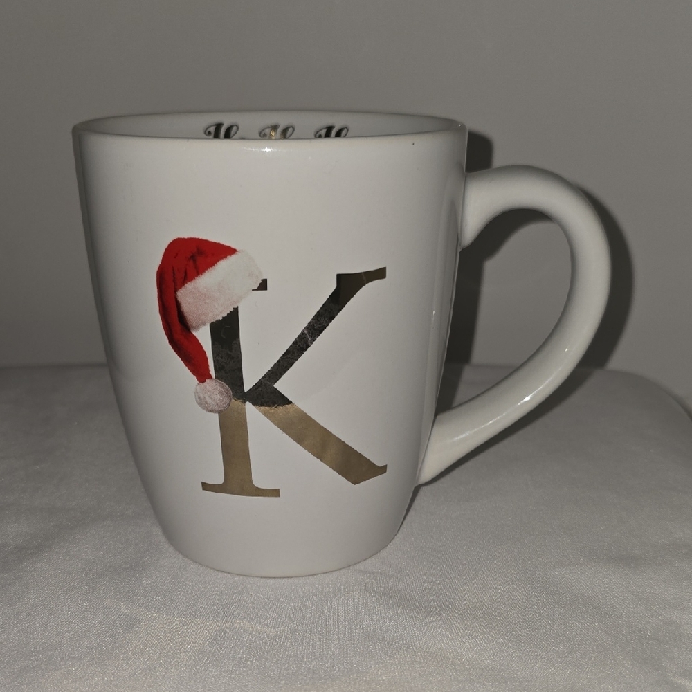 Festive White Mug with Gold Letter K and Santa Hat Coffee Mug